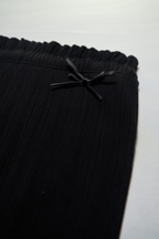 Black flared leggings with ruffles