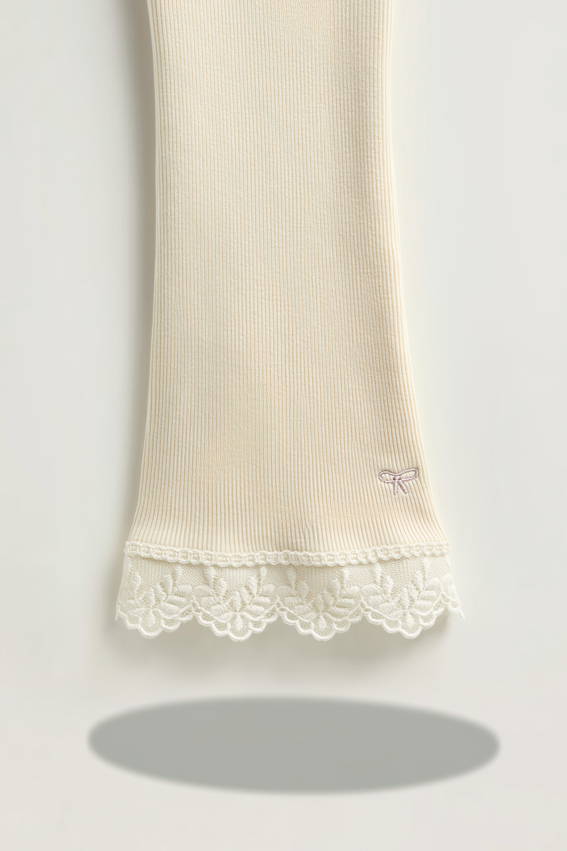 Girls light beige ribbed flared leggings with lace trim