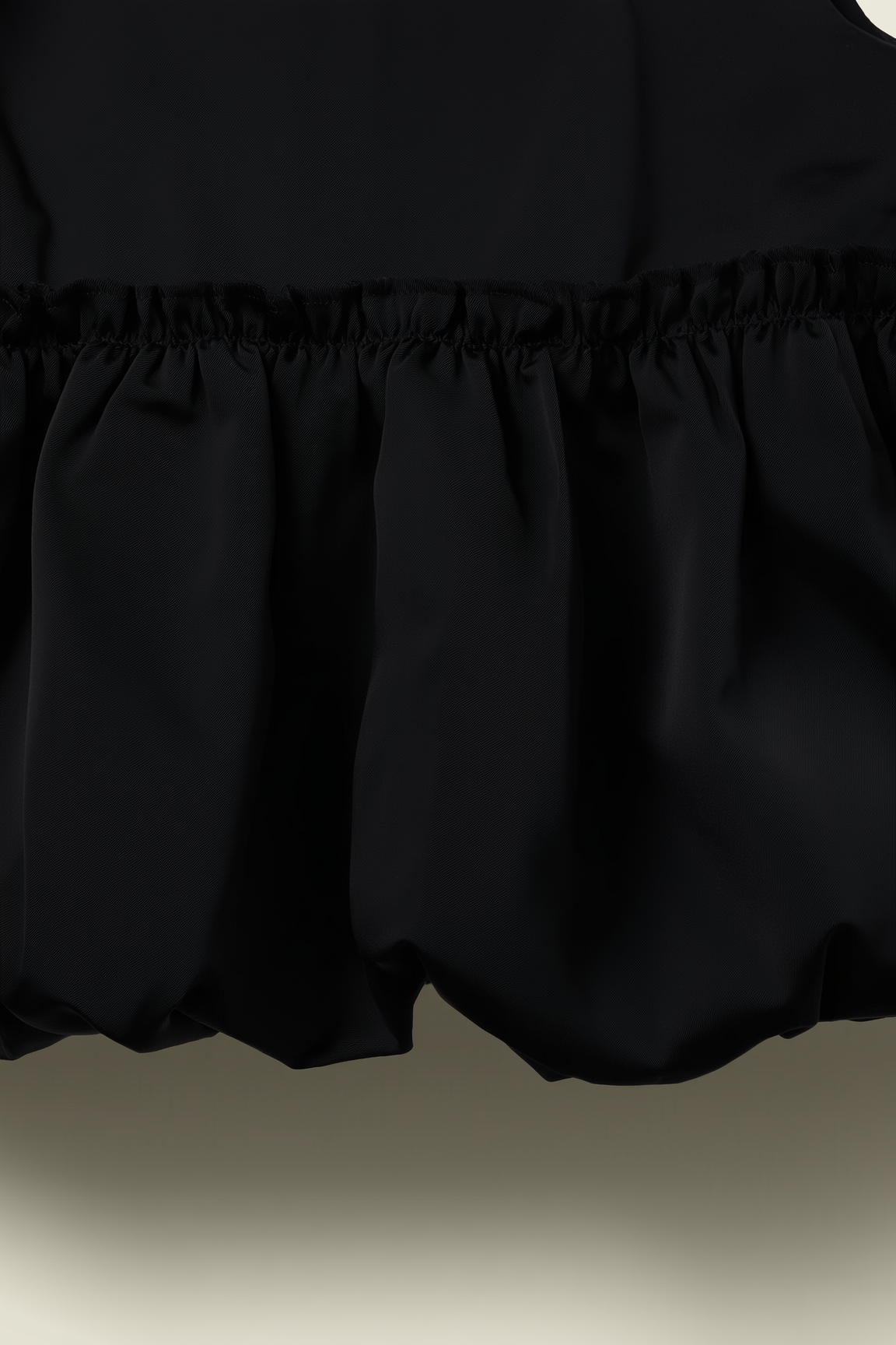 Black Sleeveless Bubble Hem Top