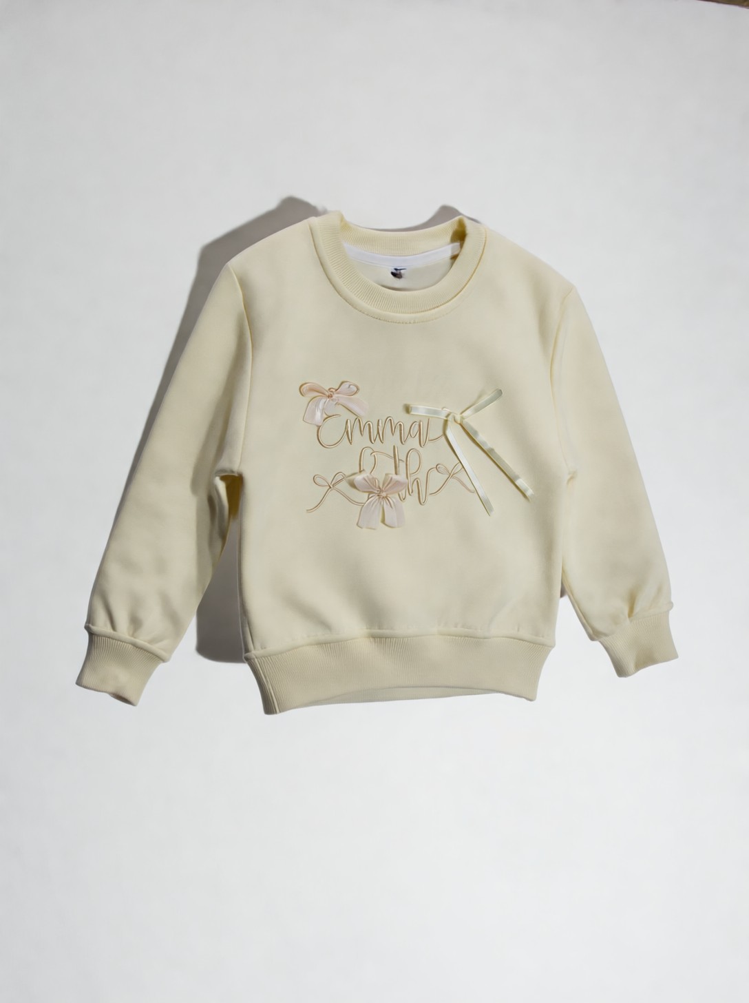 Motif-Detail Sweatshirt with Decorative Bows