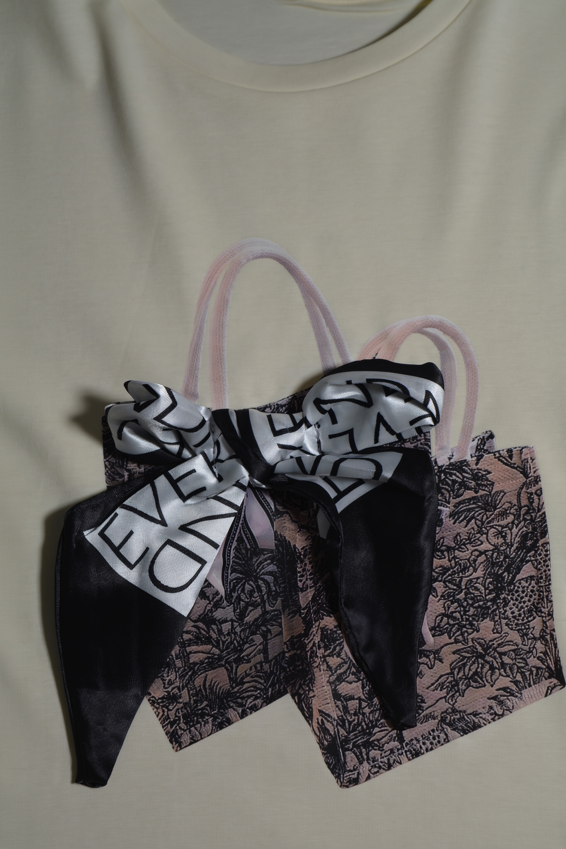 Casual Chic Cream T-Shirt with Bow Details