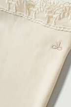 Girls light beige ribbed flared leggings with lace trim