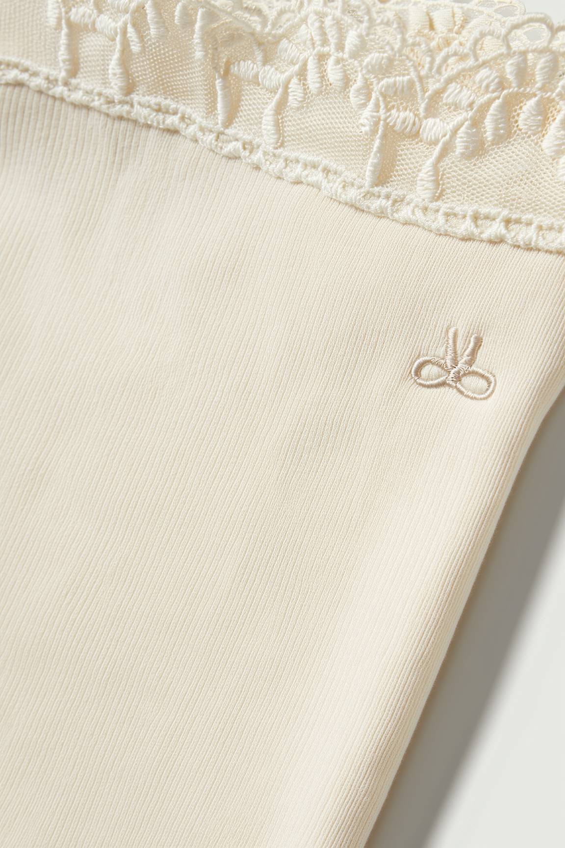 Girls light beige ribbed flared leggings with lace trim