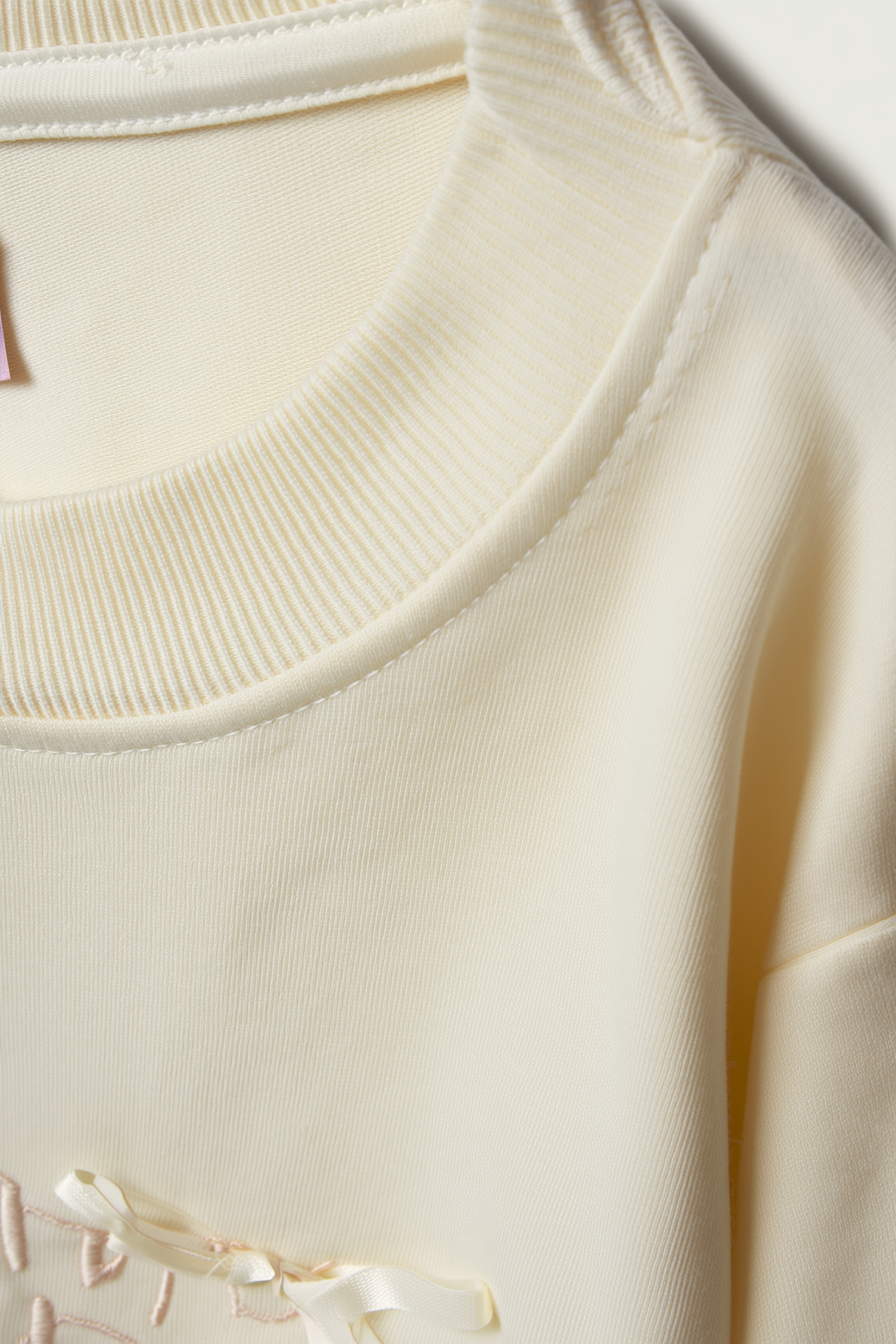 Motif-Detail Sweatshirt with Decorative Bows