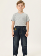 Dark wash denim jeans with yellow smiley-face patch